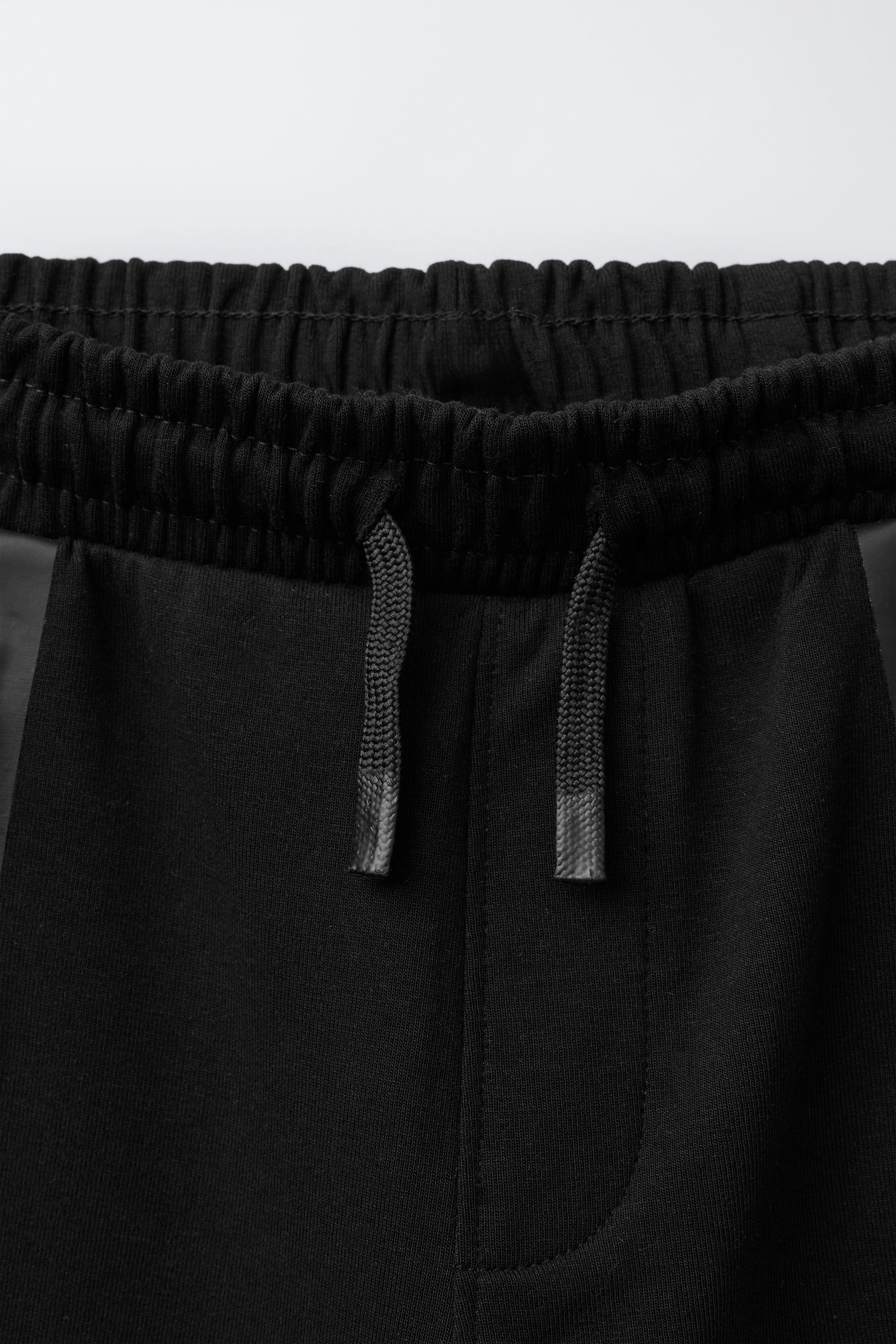 SPORTY INTERLOCK JOGGERS